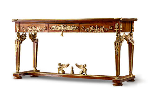 Empire Neoclassical style fire gilt-ormolu-mounted and veneer inlaid freestanding Console Table